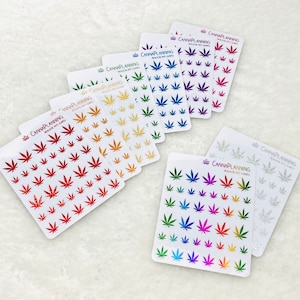 Set van 9 MISFIT doorzichtige verijdelde kleine cannabisbladstickers (*vorige productierun van buitenbeentjes*) | Sticker wietplanner marihuana