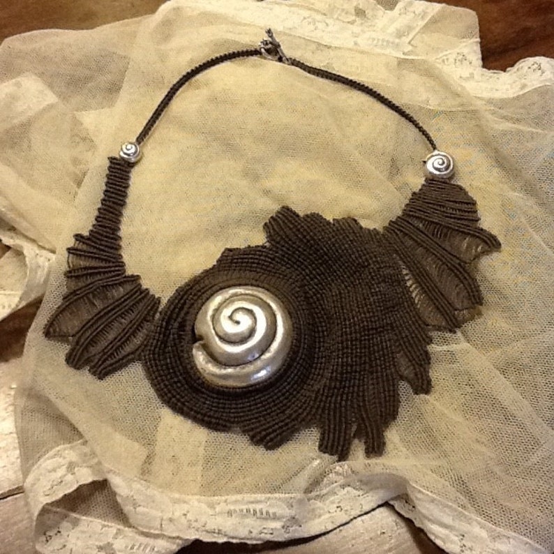 Macrame necklace with silver inserts Shells