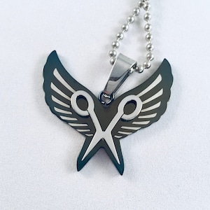 Solid metal scissor necklace in blue or black!
