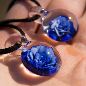 Glass flower pendant deals