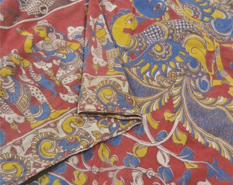 May include: Red cotton fabric with a traditional Indian design featuring peacocks, flowers, and figures in blue, yellow, and white.