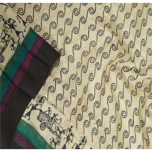 May include: A cream-colored fabric with a black and white pattern of swirling lines. The fabric has a black border with a thin green and purple stripe.