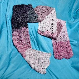 Soft light to mid-weight wave inspired crocheted scarf in pinks and blacks