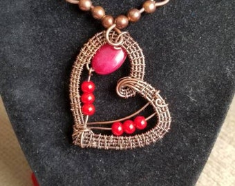 Copper heart pendant.  Wire weave copper heart pendant with red jade beads and cabachon .