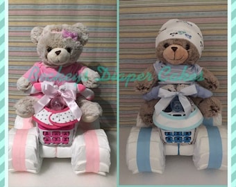 diaper cake with baby climbing