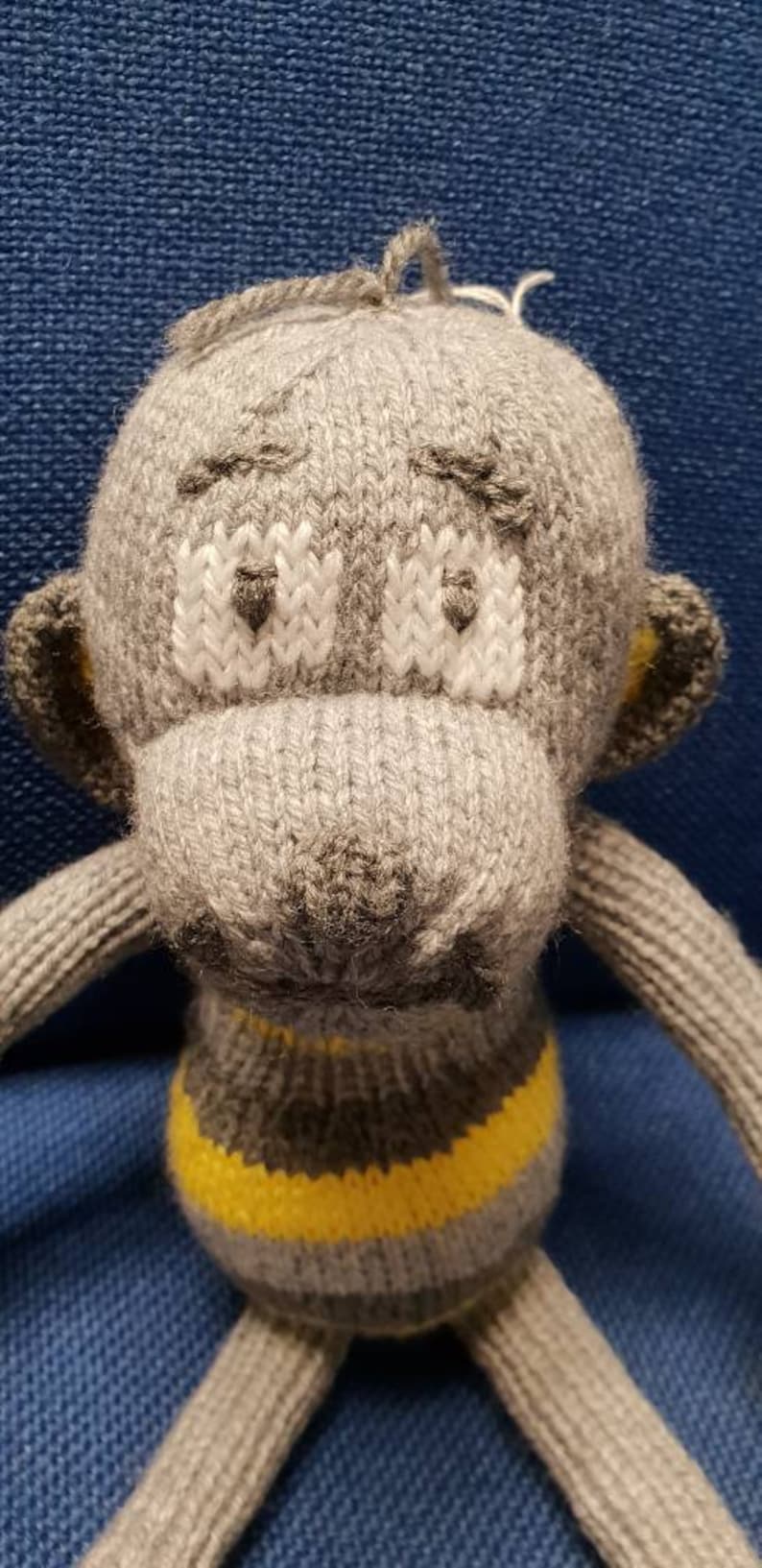 Hand knitted cheeky monkey cuddly toy