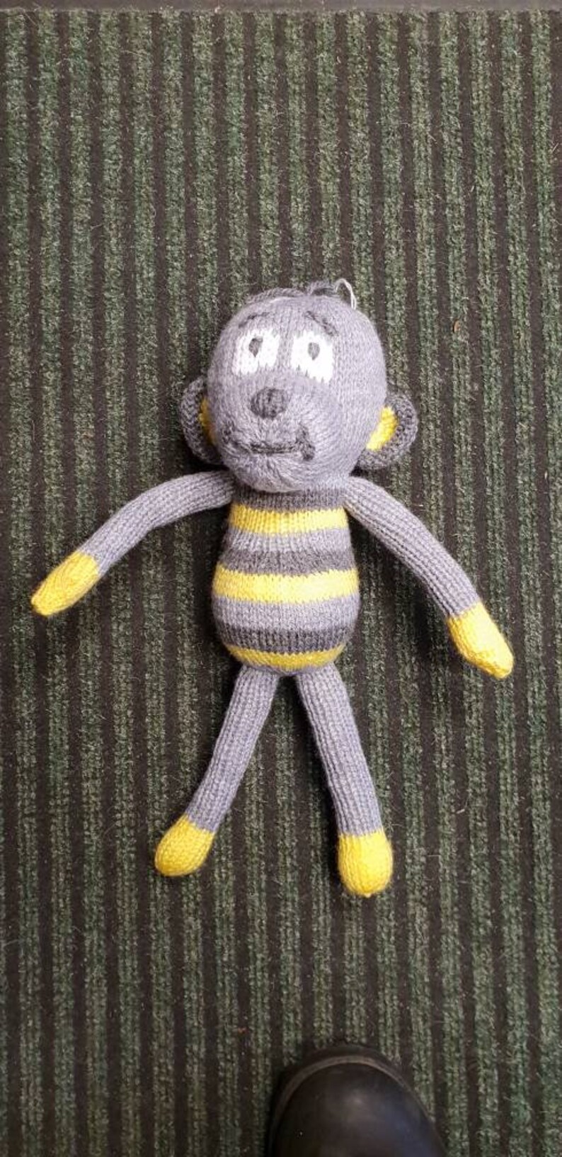Hand knitted cheeky monkey cuddly toy