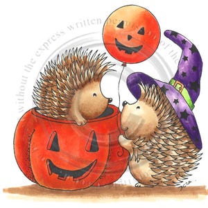 May include: Two hedgehogs dressed for Halloween. One is inside a carved pumpkin and the other is holding a jack-o'-lantern balloon.