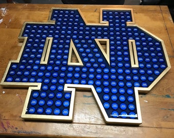 Bottle Cap Art - Notre Dame ND Insignia Logo - Metallic Gold Trim - Table Top Epoxy - Highly Reviewed