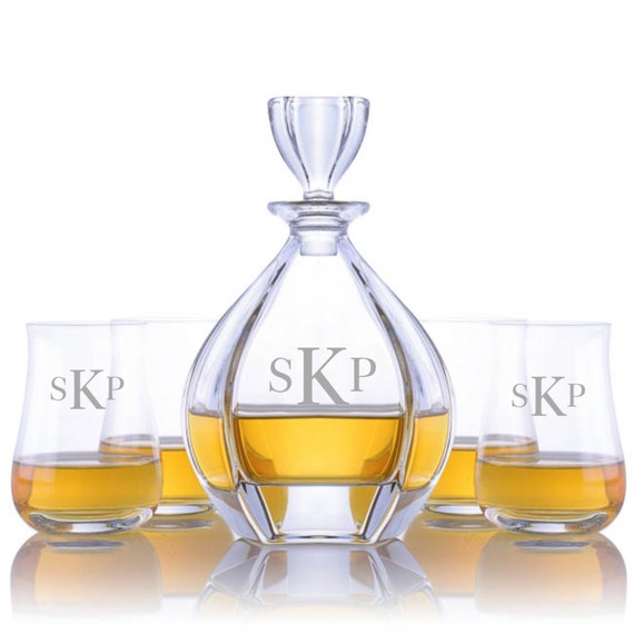 A personalized, hand-engraved crystal decanter set that looks like it belongs in a gentlemen's club — the kind of gift that actually gets displayed on a bar cart.