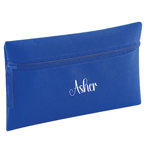 Personalised bright royal blue pencil case with zip closure, customised with a child's name in white vinyl. Durable 600D polyester school pencil case for pens, pencils and stationery, ideal for school, nursery and back to school essentials.