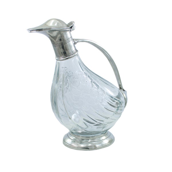 Bouteille Decanter étain cruche et un verre de vin. Une forme de canard. Objet main esclusivo.