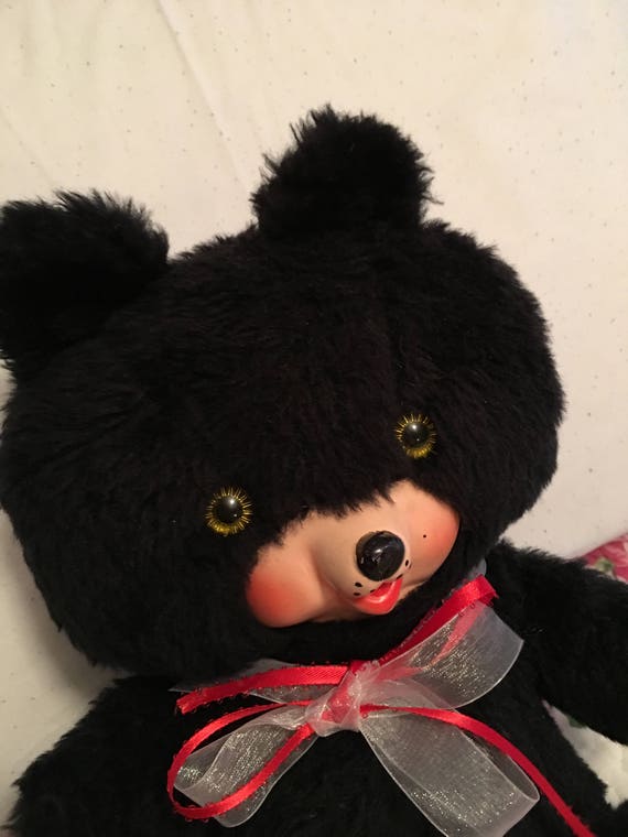 teddy bear with plastic face