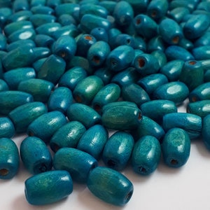 50pcs Teal Blue Dyed Wooden Oval Spacer Beads, 12x8mm - B23857