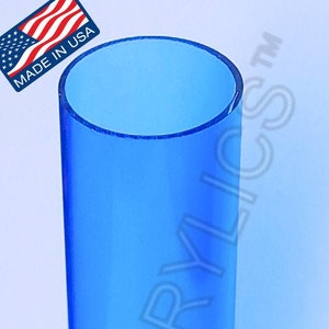 May include: A clear blue acrylic tube, made in the USA. The tube is cylindrical and has a smooth, polished finish.  The tube is approximately 6 inches tall and 2 inches in diameter.