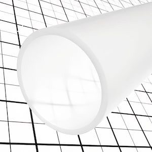 May include: A white, translucent cylindrical object with a smooth surface. It is set diagonally against a black and white grid background. The open end of the cylinder is visible, creating a contrast in textures and shapes.
