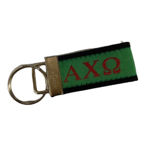 Letra griega Alpha Chi Omega Sorority Web Llavero Fob. Accesorios griegos con licencia oficial.