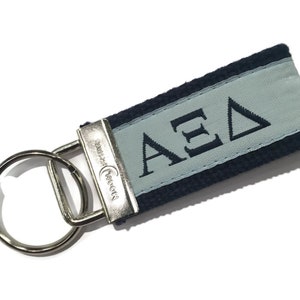 Greek Letter Alpha Xi Delta Sorority  90 Web Key Chains.  Officially Licensed Accessories.