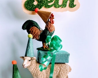 Schleich cockerel cake topper, add your own accessories, includes a personalized mini flag with wording of your choice.