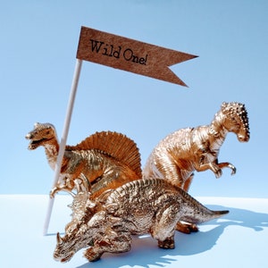 Cake Topper gold dinosaur, includes a mini flag with wording of your choice.