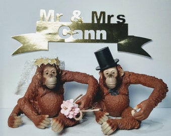 Schleich orangutan wedding cake topper, bride and groom, bride and bride, groom and groom.