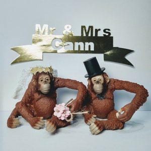 Schleich orangutan wedding cake topper, bride and groom, bride and bride, groom and groom.