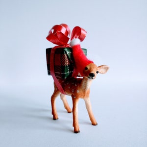 Schleich Christmas fawn animal cake topper, wearing a santa hat, includes a mini flag with wording of your choice.