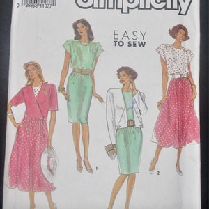 May include: Simplicity sewing pattern number 7164, size N5 (10-18), EUR N5 (38-46). The pattern includes four different dress designs: a green dress with a belt, a pink polka dot dress, a green dress with a white jacket, and a pink polka dot skirt with a white top.