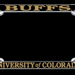 May include: A black and gold University of Colorado license plate frame with the word "BUFFS" in gold lettering at the top and "UNIVERSITY of COLORADO" in gold lettering at the bottom. The frame has a silver border.