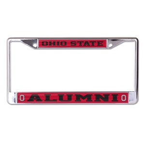 May include: Chrome license plate frame with a red and black Ohio State Alumni design. The frame has the words "Ohio State" in black on a red background and "Alumni" in black on a red background with a large "O" on either side.