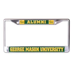 May include: A chrome license plate frame with the words "ALUMNI" and "GEORGE MASON UNIVERSITY" in yellow lettering on a green background. The frame has the George Mason University logo on each end.