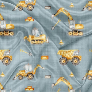 May include: A seamless pattern featuring yellow construction vehicles on a blue background. The pattern includes dump trucks, excavators, and bulldozers. There are also small orange traffic cones and yellow bricks scattered throughout the design.