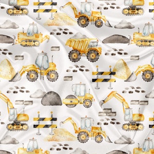 May include: A seamless pattern featuring watercolor illustrations of yellow construction vehicles on a white background. The vehicles include a bulldozer, a dump truck, a backhoe, a steamroller, and an excavator. The pattern also includes black and yellow construction barriers, gray rocks, and brown dirt.