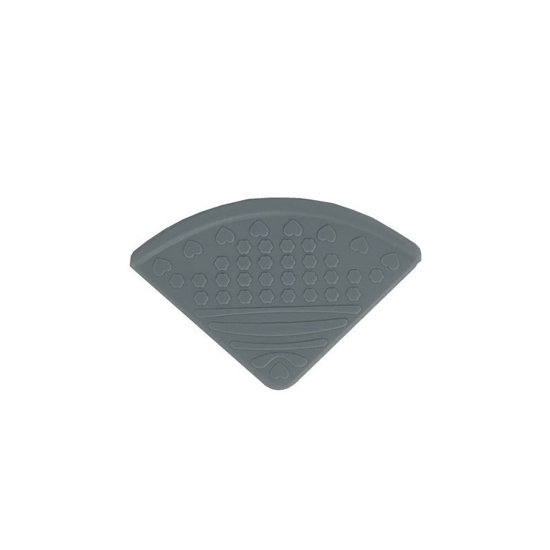May include: A gray silicone corner guard with a textured surface and a heart pattern. The corner guard is designed to protect children from sharp corners.