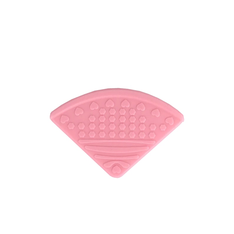 May include: Pink silicone teether shaped like a fan with a textured surface of small circles and hearts.
