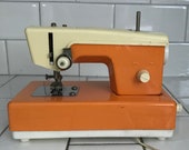 Child size Crystal sewing machine hand crank Battery Operated Japan with Plastic top display collectible with foot pedal