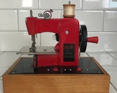 Child size Electric Little Modiste Japan sewing machine hand crank battery Operated collectible display red black chrome