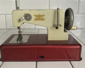 Child size Casige Western Germany sewing machine hand crank Metal 1940 39 s collectible display Red and Ivory
