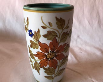 Mid Century Flora Gouda Holland Hand painted Pottery Vase with original label signed bottom Mint condition Rust and blue flowers