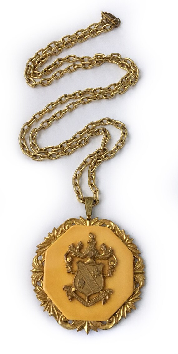 Haskell Rare Bakelite and Gilt Coat-of-Arms Herald