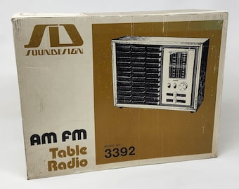 NEW - Soundesign AM/FM Table Radio - Wrapped In Box New - Slide Volume 5" Speaker Walnut Vinyl Veneer - Slide Rule Tuning And Volume Control