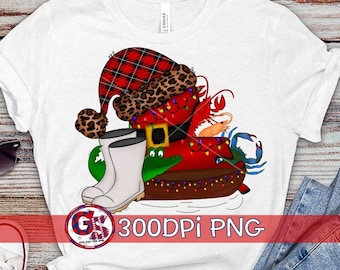 May include: White t-shirt featuring a whimsical design of a red Santa boot with a plaid and leopard print hat, adorned with Christmas lights and seafood. The design includes a crawfish, shrimp, and crab. The text "300DPI PNG" is also visible.