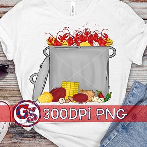 May include: A white t-shirt with a design of a pot of crawfish with various vegetables and spices. The text "300DPI PNG" is printed on the bottom of the shirt.