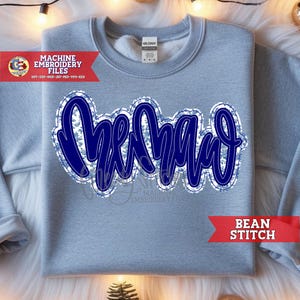 May include: A light blue sweatshirt with the word "Bernad" in a dark blue, cursive font. The word is outlined in white and filled with a blue floral pattern. The sweatshirt also has the text "MACHINE EMBROIDERY FILES" and "BEAN STITCH".