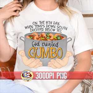 May include: White t-shirt with a gray pot of gumbo, featuring the text "ON THE 8TH DAY, WHEN TEMPS DOWN SOUTH DROPPED BELOW 70, God created GUMBO".