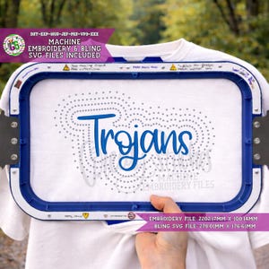 May include: A white fabric held in a blue rectangular embroidery hoop featuring the blue text "Trojans" surrounded by a dotted pattern. Text on the image includes "MACHINE EMBROIDERY & BLING SVG FILES INCLUDED" and dimensions of 2202.17mm x 100.14mm.