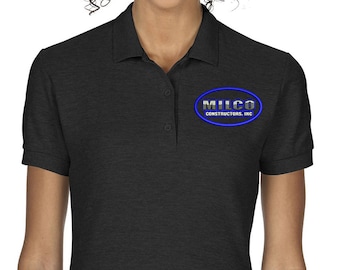 May include: A dark gray women's polo shirt with a blue oval logo that says "MILCO CONSTRUCTORS, INC."