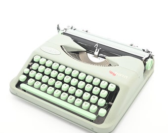 Hebrew Hermes Baby Typewriter with Like New platen. restored and serviced by Mr and Mrs Vintage typewriters