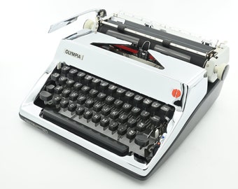 Chrome plated Olympia SM8 Typewriter serviced and restored by Mr & Mrs vintage typewriter