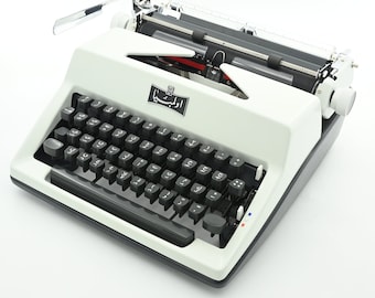 Olympia Arabic Typewriter عربية آلة كاتبة serviced and restored by Mr and Mrs Vintage typewriters.